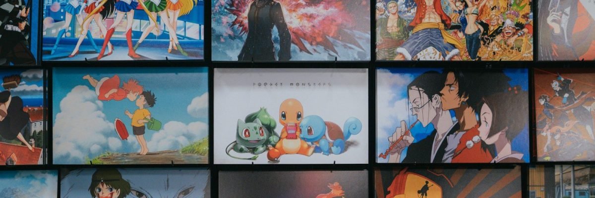anime character collage photo on black wooden shelf